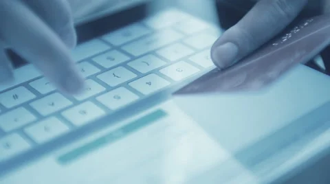 Woman using computer for on line purchase with credit card Stock Footage 51837362