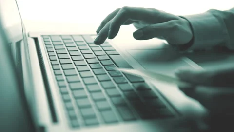 Woman using computer for on line purchase with credit card. Toned in blue color Stock Footage 87836744