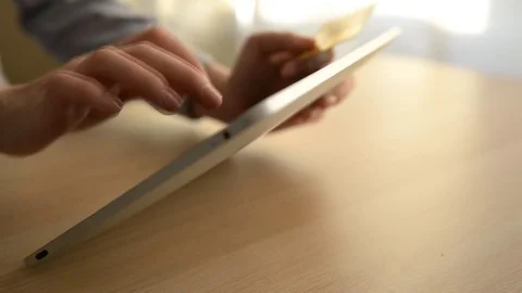Woman using computer for on line shopping with credit card Video stock 73736874