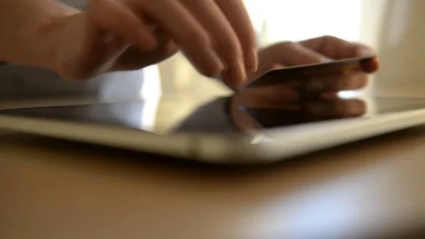 Woman using computer for on line shopping with credit card Stock Footage 73736967