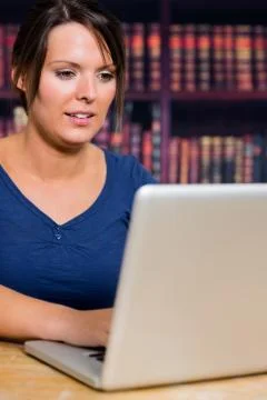Woman using a computer Foto stock