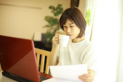 Woman using a computer Stock Photos
