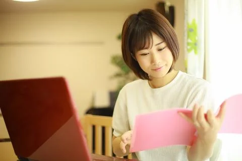 Woman using a computer Stock Photos