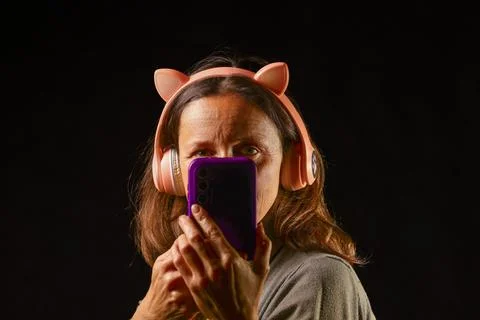 Woman using connected audio technology, Stock Photos