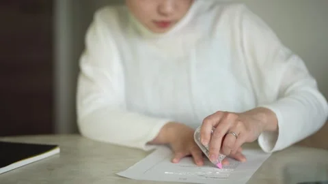 Woman using correction tape Stock Footage 278409290