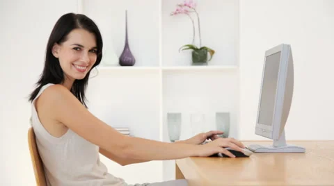 Woman Using a Desktop Computer at Home Stock Footage 912284