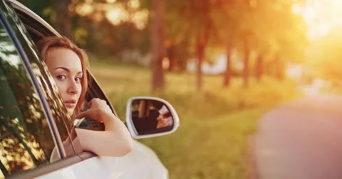 Woman using digital smartphone in the car. Taking pictures on a cell phone. 스톡 동영상 50958004