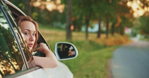 Woman using digital smartphone in the car. Filmed in 4K DCi resolution.  Stock-Footage 50958022