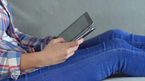 Woman using digital tablet and checking smart phone Stock Footage 54783658