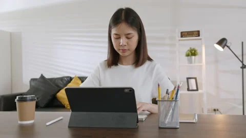 Woman using digital tablet and video call with learning online on internet. 스톡 동영상 135503022