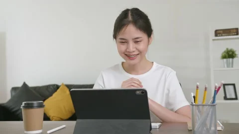 Woman using digital tablet and video call with learning online on internet. 스톡 동영상 135503340