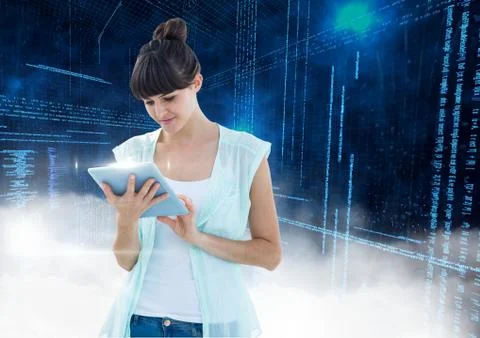 Woman using digital tablet with binary codes in background Stock Photos