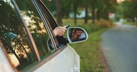 Woman using digital tablet in the car, reading road map  스톡 동영상 50960120