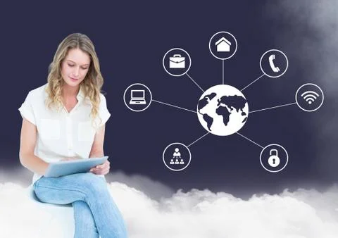 Woman using digital tablet with cloud and networking icons in background Foto stock