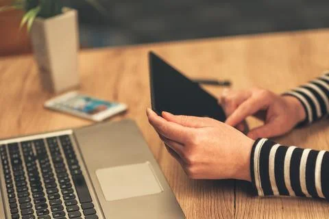 Woman using digital tablet computer in business office Stock Photos