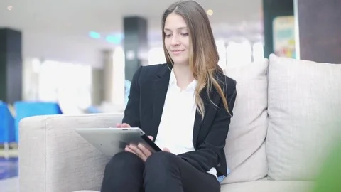 Woman using digital tablet Stock Footage 75171661