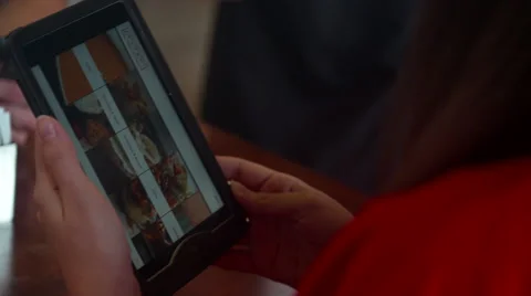 Woman using digital tablet menu and ordering at cafe. Stock Footage 64094551