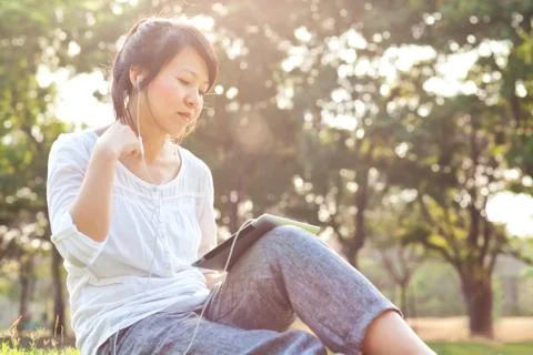 Woman using digital tablet Stock Photos