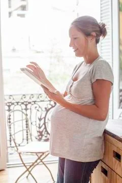 Woman using digital tablet Stock Photos