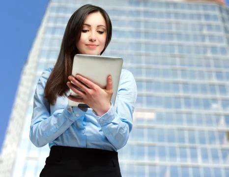 Woman using a digital tablet Stock Photos