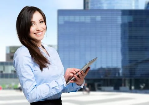 Woman using a digital tablet Stock Photos