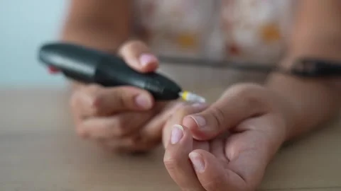 Woman Using Electric Nail Drill for Home Manicure Close Up Stock-Footage 341575402