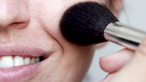 Woman using on face,cheek nose under eye area large powder brush Видео 210221592