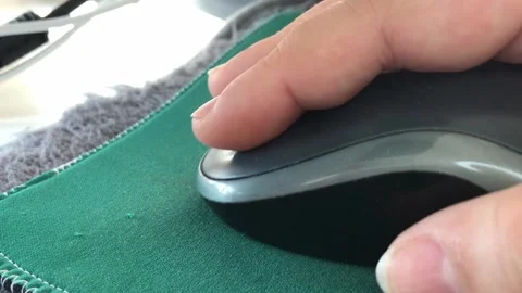 Woman using gray computer mouse Stock Footage 164566454