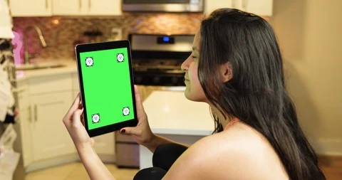 Woman using green screen tablet Stock Footage 96307629