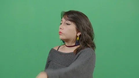 Woman using hands as hearing device and facial expression of listening better Stock Footage 117977827