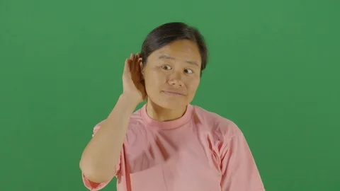 Woman using hands as hearing device and facial expression of listening better Video stock 126309066