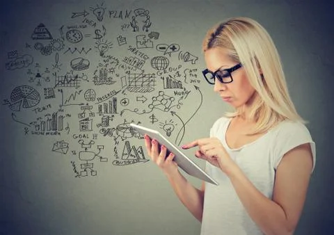 Woman using her tablet computer Stock Photos