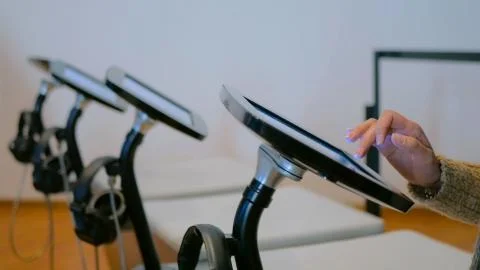 Woman using interactive display tablet at jewish modern history museum Stock Photos