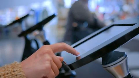 Woman using interactive display tablet at jewish modern history museum Stock Photos