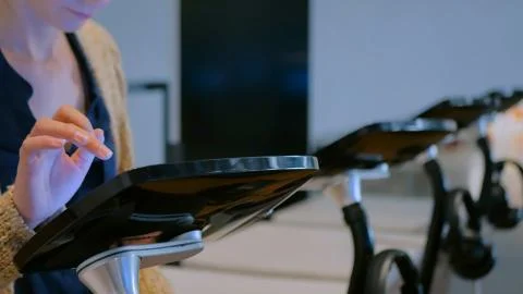 Woman using interactive display tablet at jewish modern history museum Stock Photos