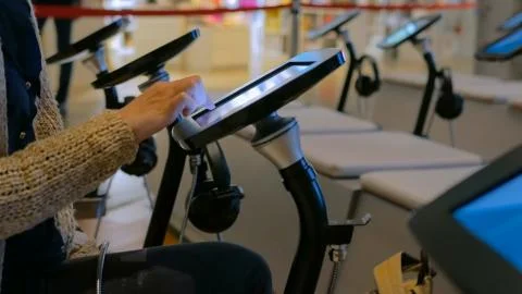 Woman using interactive display tablet at jewish modern history museum 스톡 사진