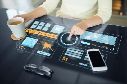 Woman using interactive panel with data Stock Photos