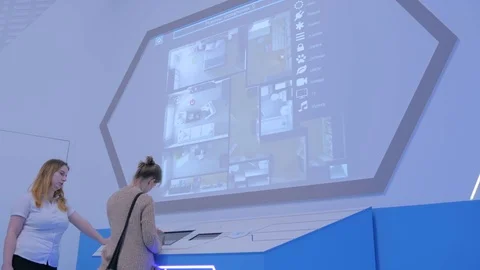 Woman using interactive touchscreen console Stock Footage
