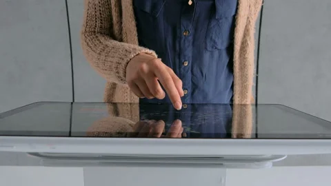 Woman using interactive touchscreen display at urban exhibition Stock Footage 85611923