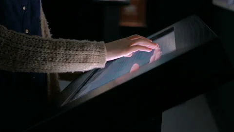 Woman using interactive touchscreen display Stock Footage 85615227