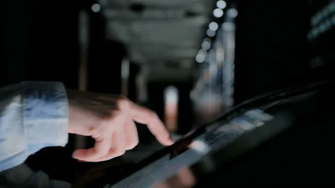 Woman using interactive touchscreen display at modern history museum Stock Footage 106023648
