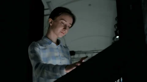 Woman using interactive touchscreen display at modern history museum Stock Footage 108028028