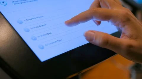 Woman using interactive touchscreen display tablet Stock Photos