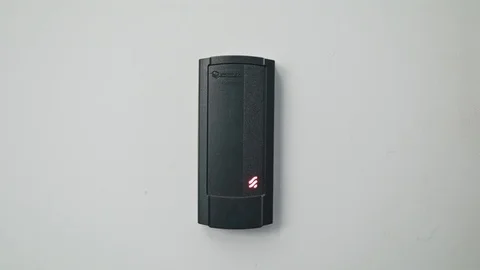Woman Using Intercom at Residential Building Stock Footage 82649026