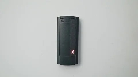 Woman Using Intercom at Residential Building Stock Footage 82649107