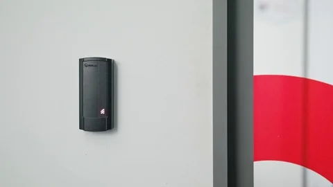 Woman Using Intercom at Residential Building Stock Footage 82667218