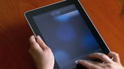 Woman using an iPad tablet Stock Footage 8223936