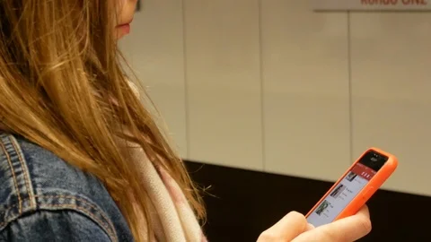 Woman Using Iphone Waiting For Train In Warsaw Stock Footage 111970426