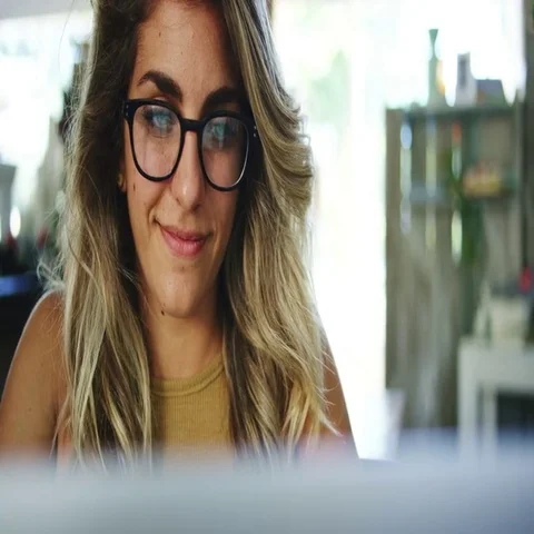 Woman using laptop computer in coffee shop, working in mobile office Stock Footage 69390319
