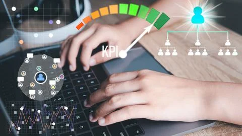 A woman using a laptop computer Stock Photos
